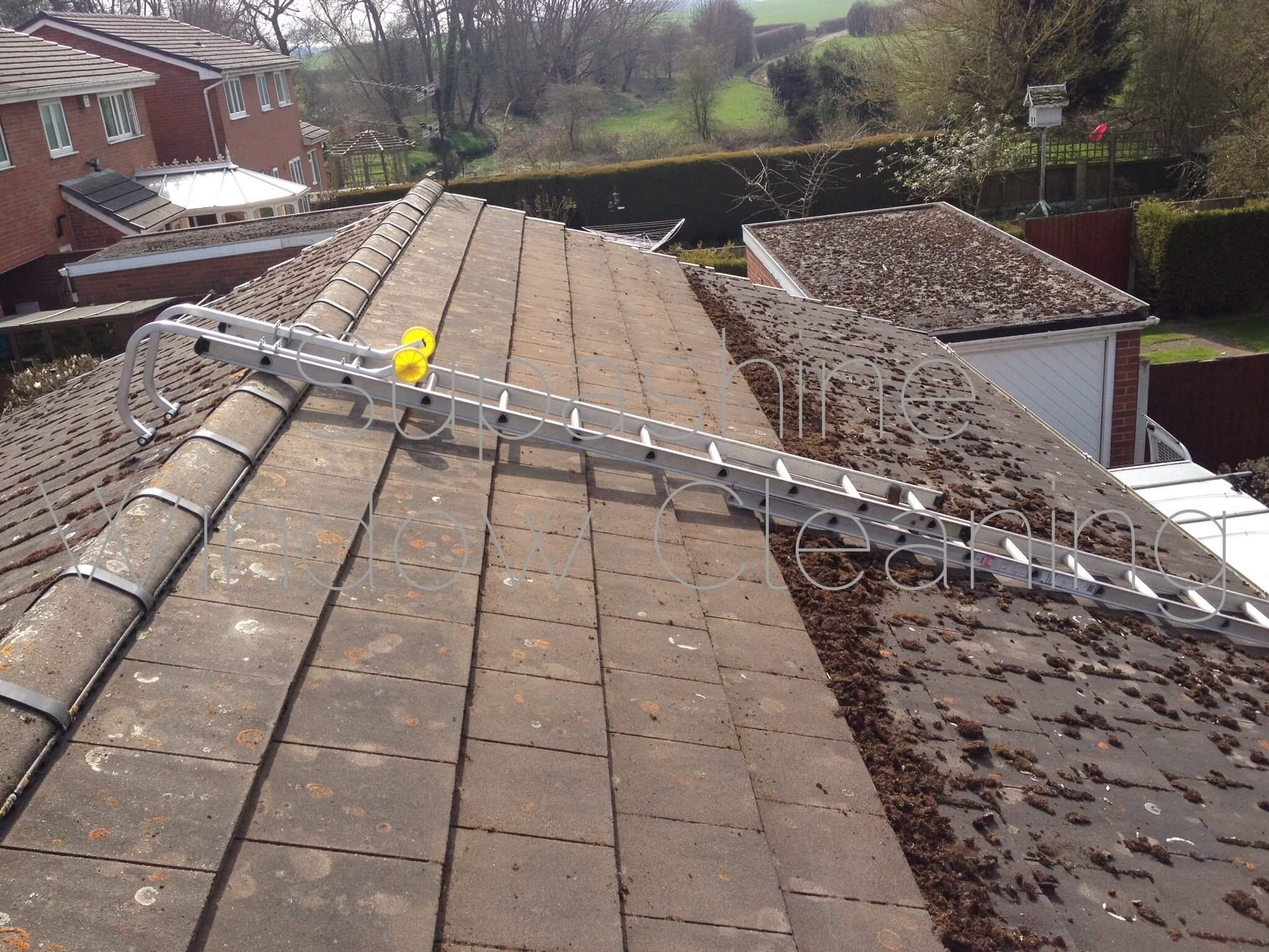 Pressure washing roof tiles