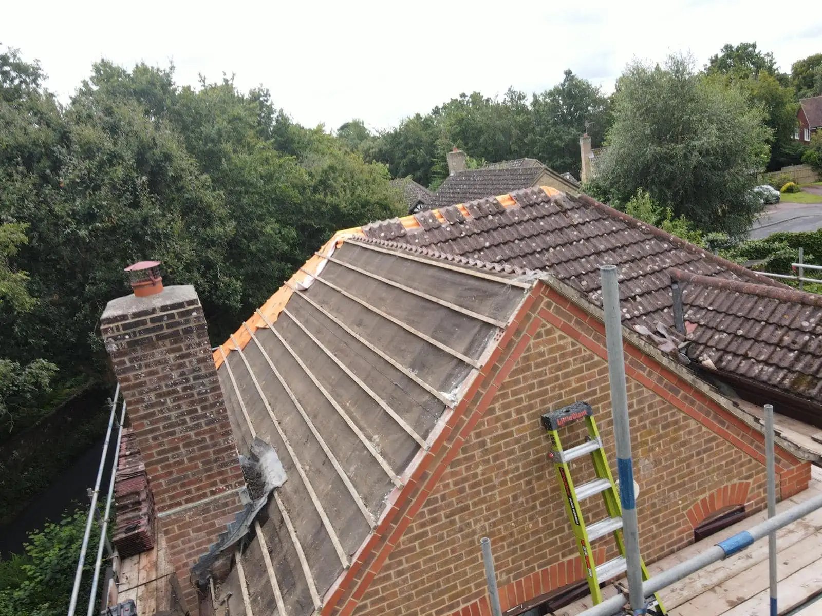 Professional roof repair in progress